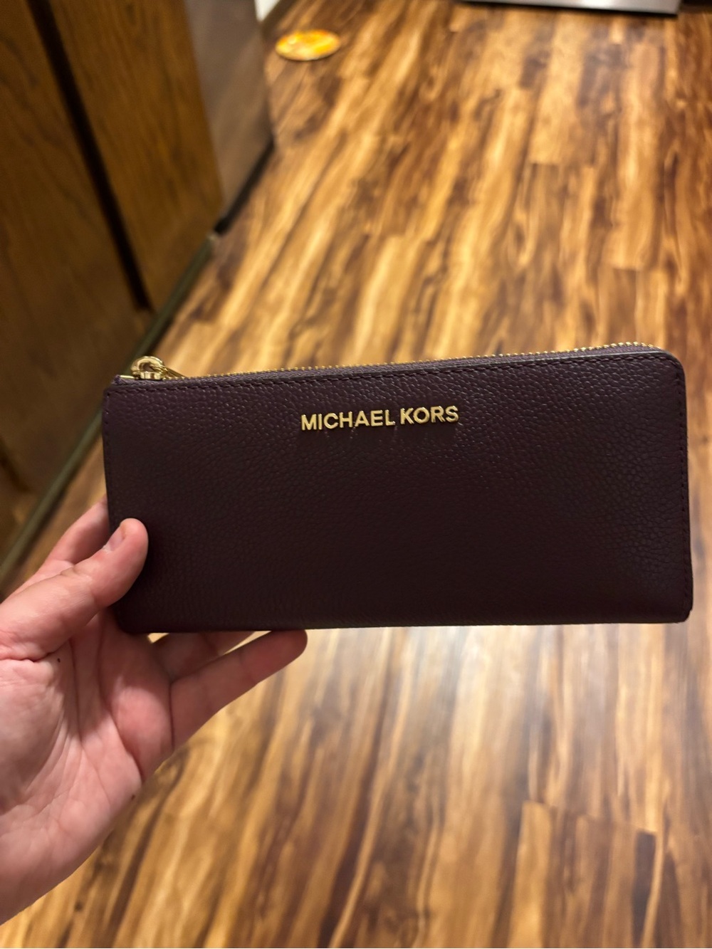 Michael Kors Zip-Around Wallet in Plum with Gold Hardware